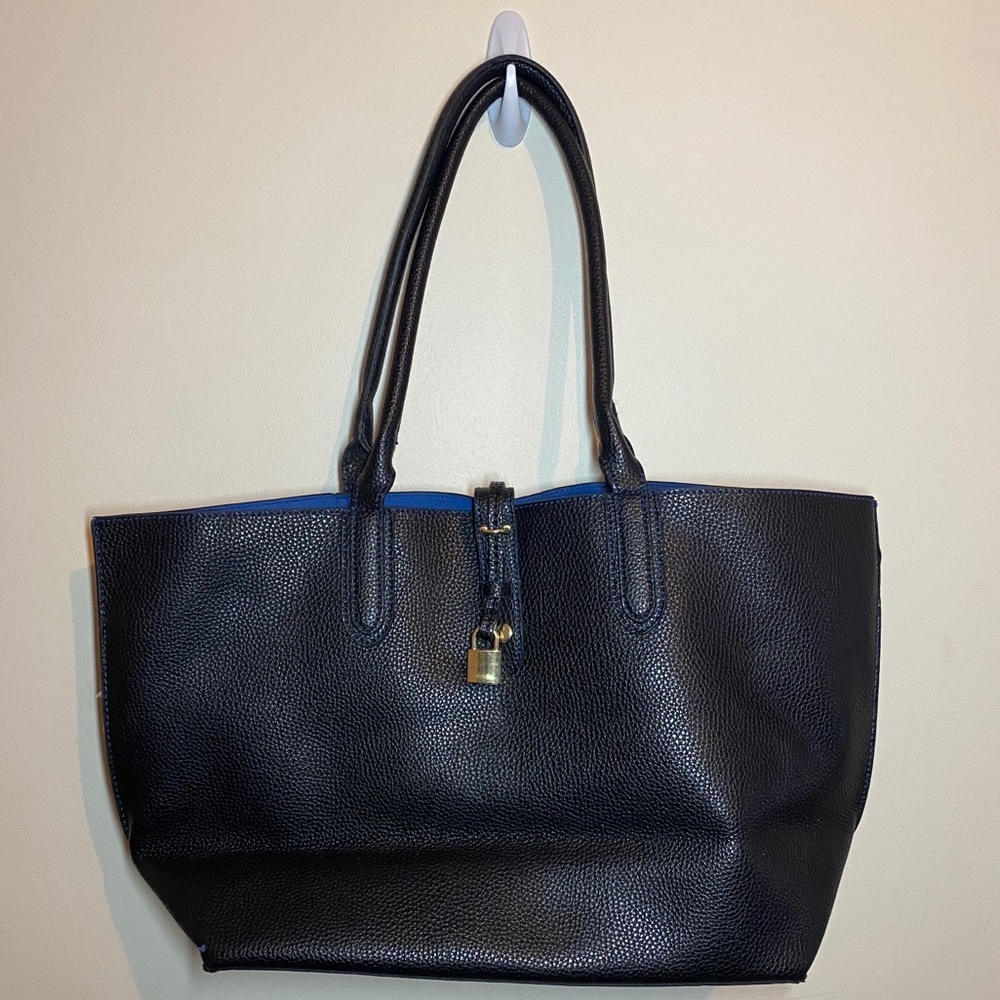 Black bag with blue interior and small lock